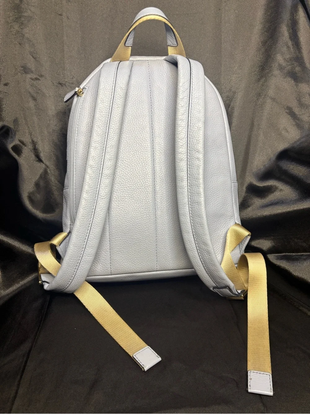 Michael Kors Slater Medium Pebbled Leather Backpack in a pale blue with dust bag